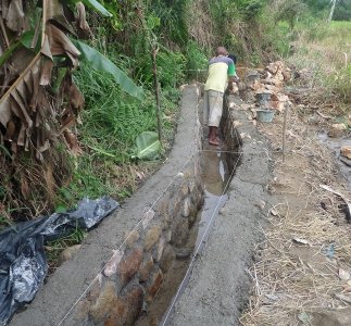SOL berkontribusi dalam memperbaiki drainase irigasi di Desa Pandahan Sira